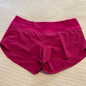 Great condition, magenta speed shorts size 6